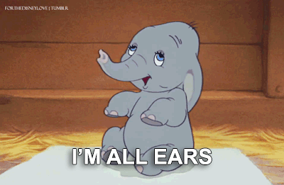 dumbo-baby-elephant-cartoon-opening-ears-with-caption-im-all-ears.gif