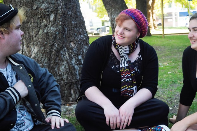 Friends talking at the park